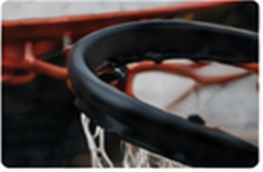 BallerBase net being secured to an outdoor rim